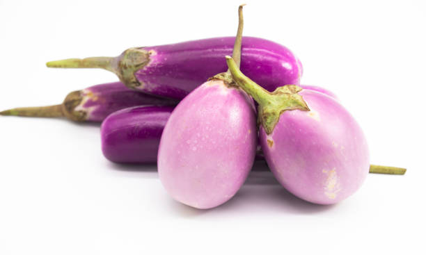 istock two eggplant with drop of water on white background 1392721879
