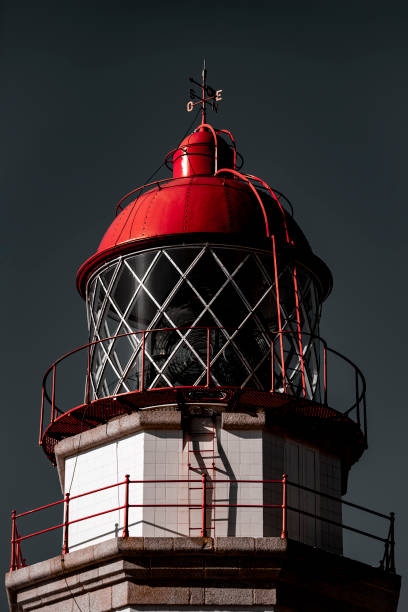 istock Red lamp tower of a beautiful lighthouse 1392721887