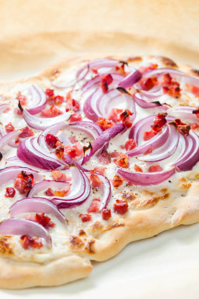 istock pizza with red onion, bacon and cream 1392722695