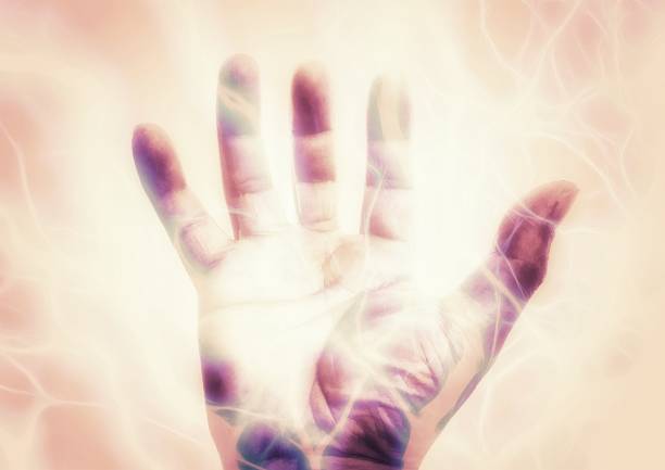istock 3D illustration that emits light energy from the hand 1392724689