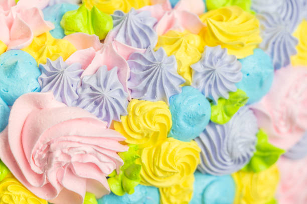 istock Cake icing floral swirl background 1392732450