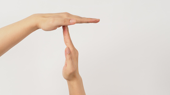 Time out hands gesture on white background.
