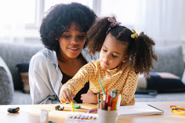 istock Mother And Daughter Colouring 1392735640