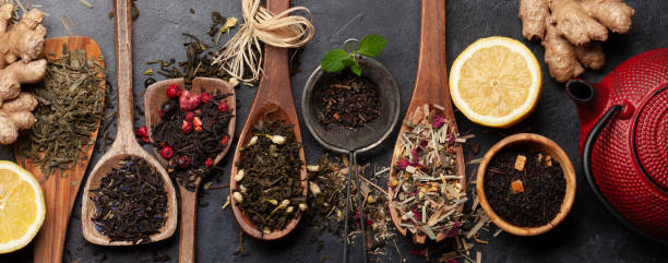 istock Various dried tea in wooden spoons 1392739250