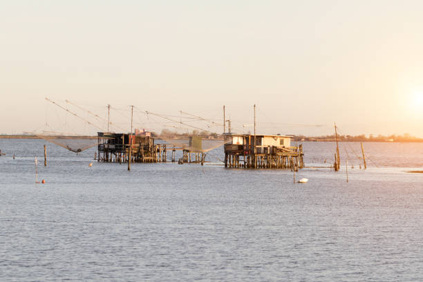 Typical fishing shed from the Po Delta at sunset