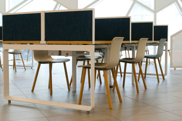 istock Indoor office space with desks 1392740485