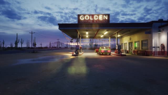 Panning shot gas station and hotel motel cafe in the Mojave Desert