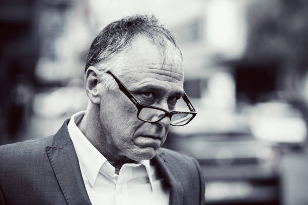 istock Middle-aged man in a city street 1392742093