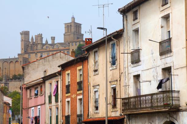 Beziers city, France Beziers city, France. Townscape street view with the cathedral. beziers stock pictures, royalty-free photos & images