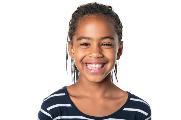 istock Adorable african little girl on studio white background 1392744007