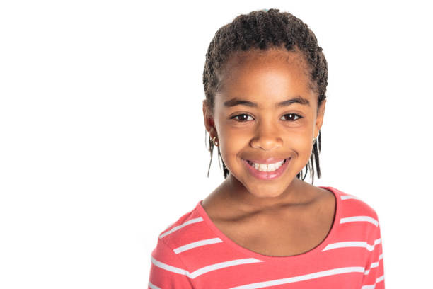 istock Adorable african little girl on studio white background 1392744095