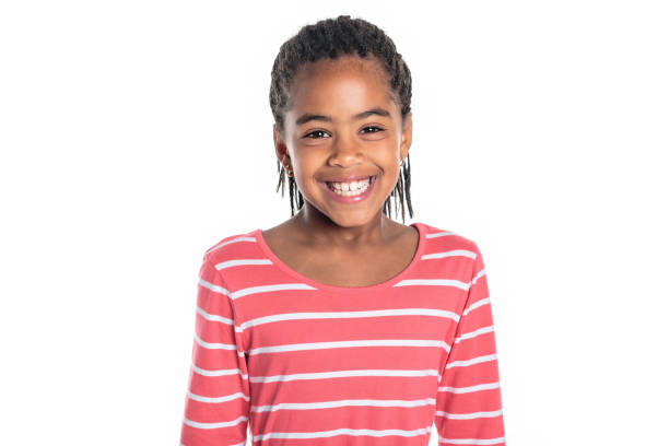 adorable african little girl on studio white background - meisjes stockfoto's en -beelden