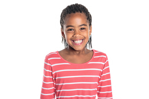 An Adorable african little girl on studio white background