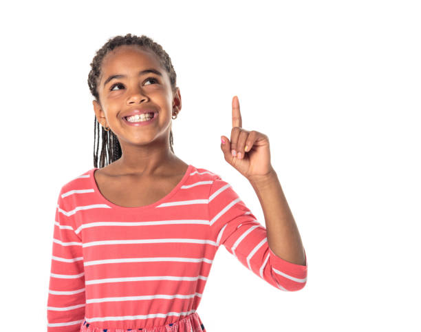 istock Adorable african little girl on studio white background 1392744104