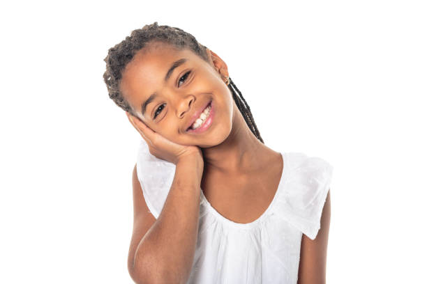 istock Adorable african little girl on studio white background 1392744215