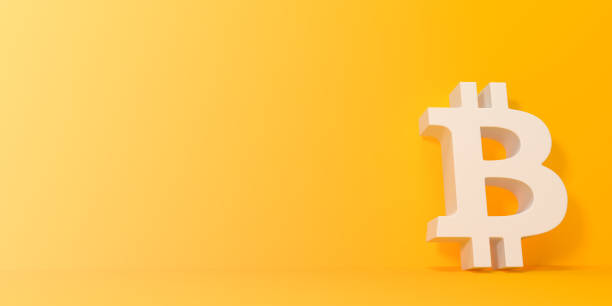 istock Symbol bitcoin on a yellow background 1392746165