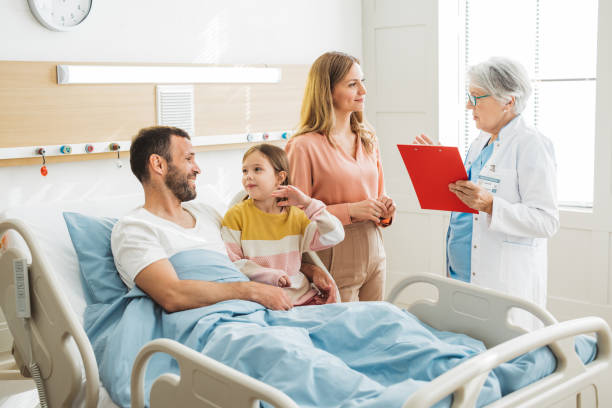 istock Visiting father in hospital 1392746476