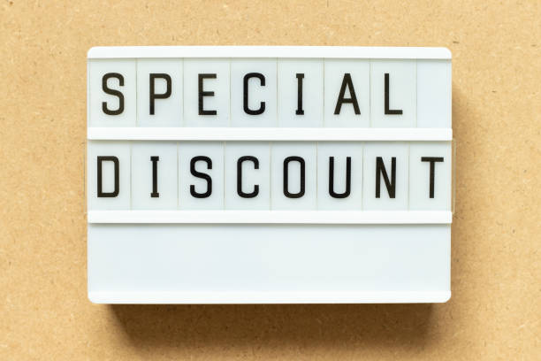 istock Lightbox with word special discount on wood background 1392746747