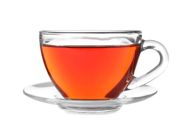 istock Glass cup of aromatic rooibos tea isolated on white 1392748499
