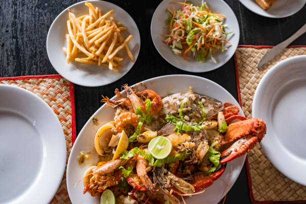 istock seafood platter on table with chips and salad 1392751580