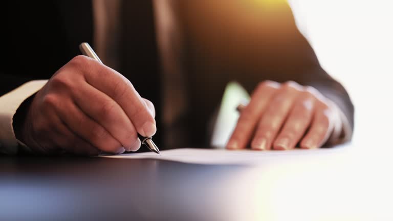 Businessman Signing Document