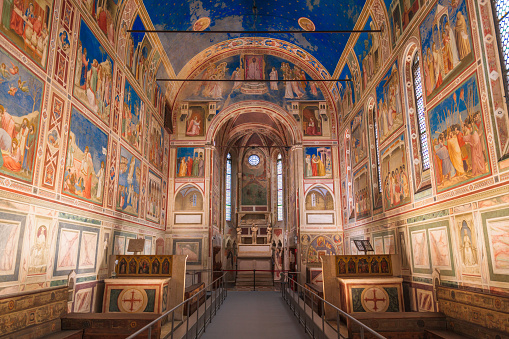 Padua, Italy - January 17, 2022: Inside Scrovegni Chapel with 14th century frescoes by Giotto. The UNESCO World Heritage Site was completed around 1305.
