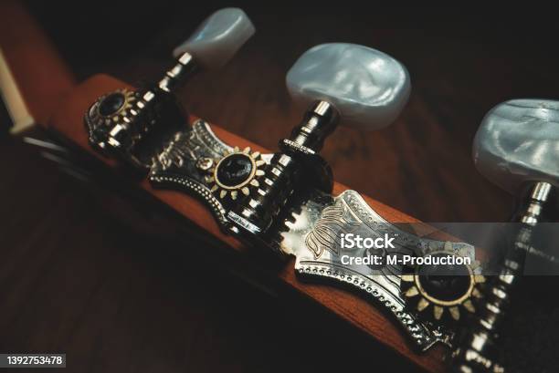 Guitar Pegs On A Sixstring Spanish Guitar Stock Photo - Download Image Now - Acoustic Guitar, Close-up, Tuning Peg