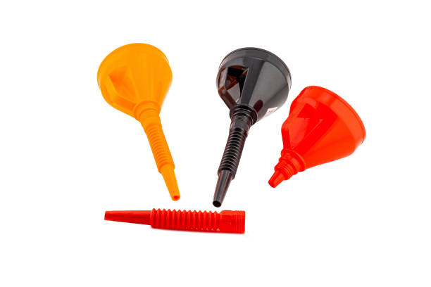 istock Different colors Plastic Funnel for gasoline and other technical liquids isolated over white background High Quality Studio Shot 1392757258