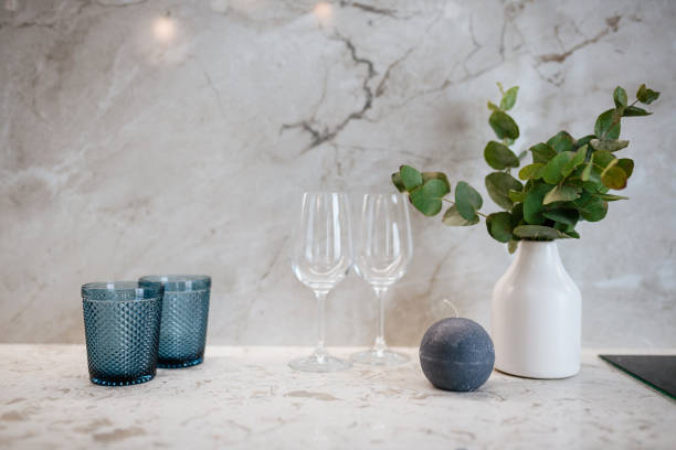 istock candle, glasses, vase in the kitchen. interior decor elements 1392764762