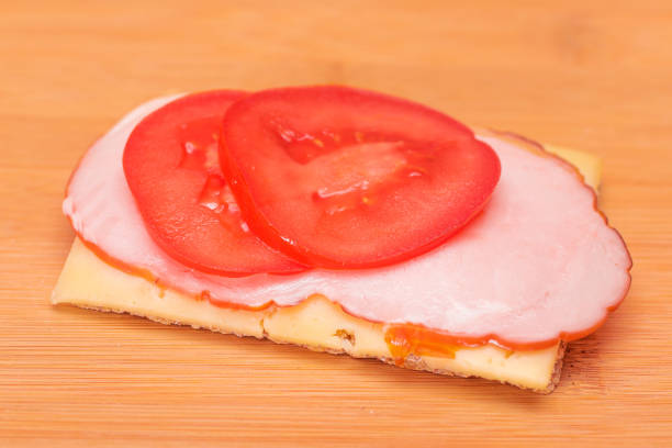 Ham sandwich with cheese, tomato and lettuce