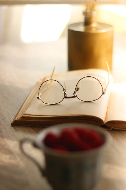 istock Raspberries, Book and Glasses 1392765108