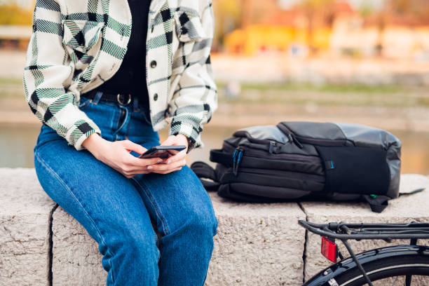 istock Woman's hands typing on smart phone 1392767345