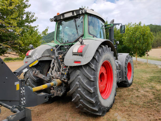 istock tractor to work in the field close-up 1392767407
