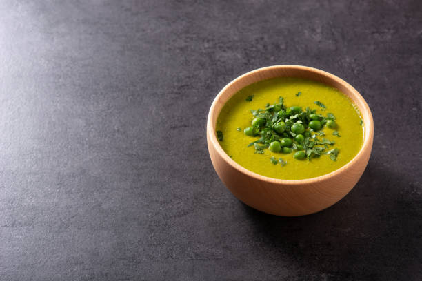 istock Green pea soup in a bowl 1392767966