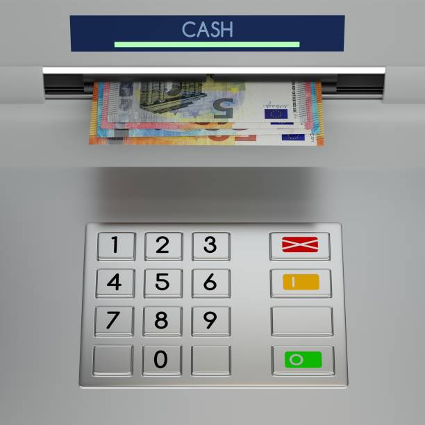 istock ATM machine, banknotes in money slot 3D illustration 1392768010