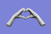 3d female hands showing a heart shape isolated on a purple color background