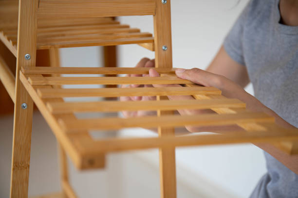 Asian woman is assembling the drying rack