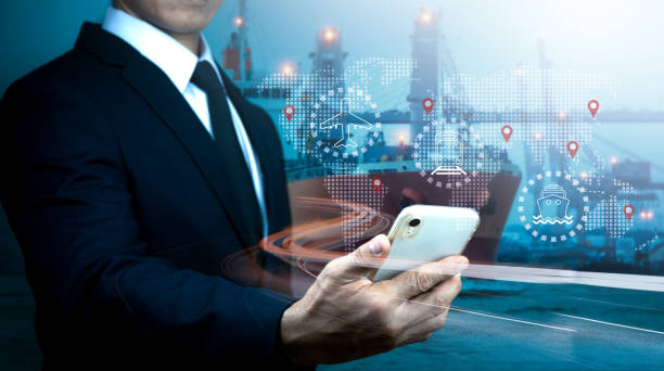 istock A businessman uses a cellphone for logistic network distribution and smart transportation, concept of networking intelligent logistics of container cargo ships, logistic import-export, and industrial. 1392777016