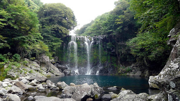 istock Cheonjiyeon Waterfall, Jeju Island, South Korea 1392782884