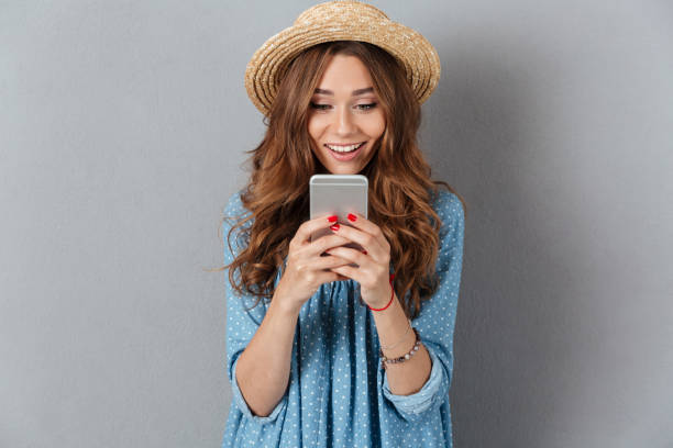 istock Happy young caucasian lady chatting by phone. 1392783041