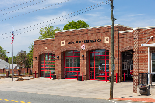 China Grove, NC, USA-17 April 2022: China Grove Fire Station next to Town Hall.