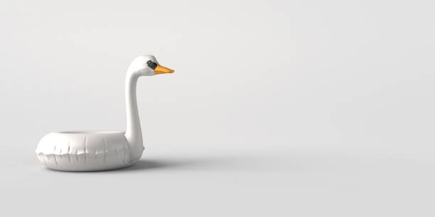 istock Swan float. Inflatable beach or pool toy. Copy space. 3D illustration. 1392788331