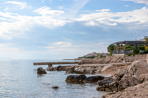 Sunbathing terraces on the coast of Mandre, Pag island, Croatia