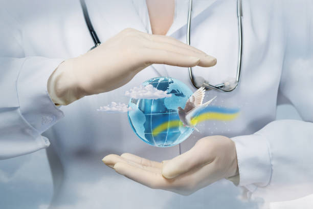 istock Concept of protecting and curing the world from war. 1392789159