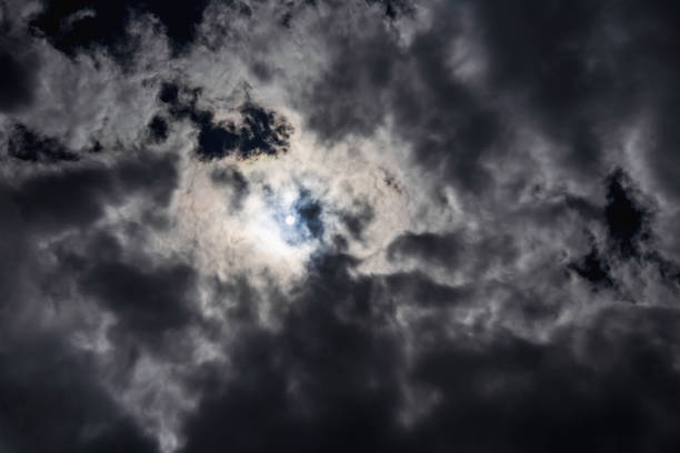 istock Dramatic storm clouds in the dark grey sky. Cloudy thunderstorm. 1392791889