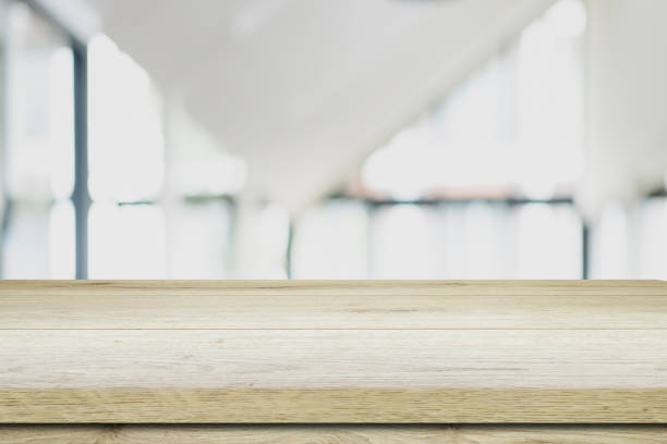 istock marble board empty table in front of blurred background. Perspective white marble over blur in coffee shop - can be used for display or montage your products.Mock up for display of product 1392793655