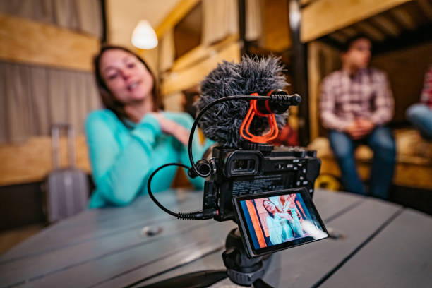 istock Woman vlogging from her hostel room 1392794746