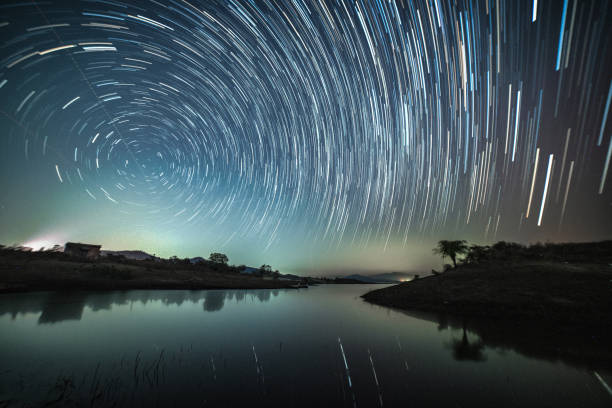 istock Circular star trails over the lake 1392799485