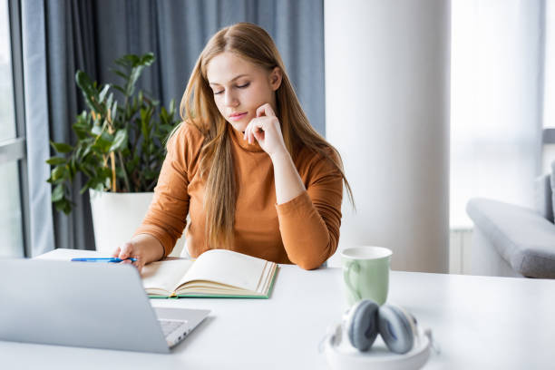 istock Young woman working in the office 1392799896