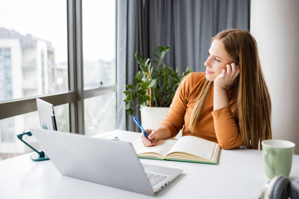 istock Young woman working in the office 1392801138